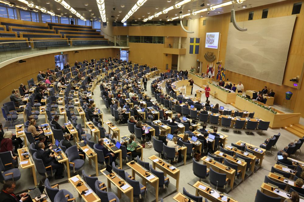 Inside the plenary hall of the Swedish parliament building.